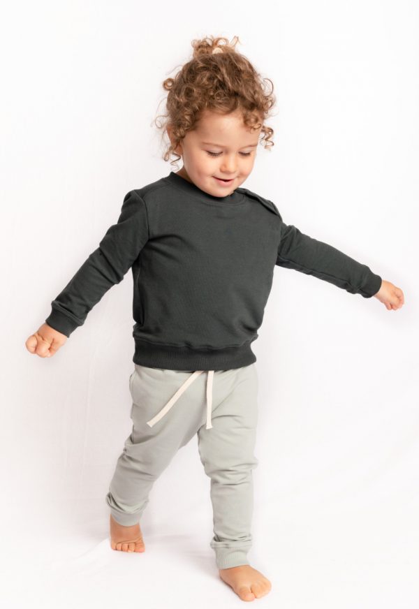 Website Olive 1 sweater : sage pants standing front